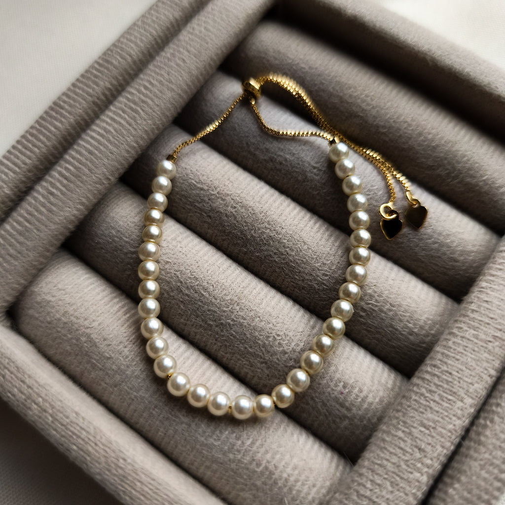 Pulseira Serene - Detalhes em Pérolas - Coleção Aurora - Banhada a Ouro 18k